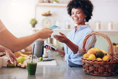 Clerk accepting payment